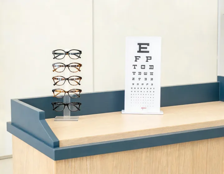 Retail optical counter staging oversized eyeglasses women